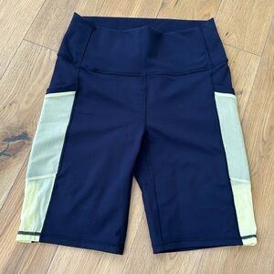 Fabletics navy and yellow biker shorts size M